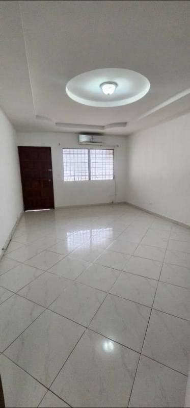 Traditional kitchen with ample cabinetry, tiled backsplash, window in family house Altos del Chase El Dorado
