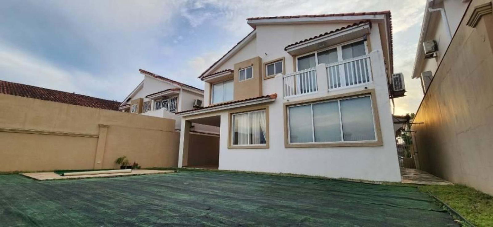 Two-story Mediterranean-inspired single-family home with yard in PH Brisas Heights Brisas del Golf Panama