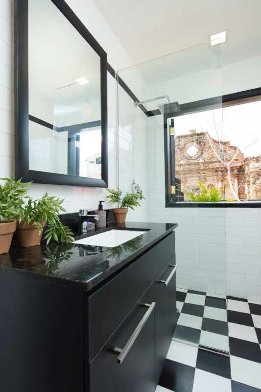 Vaulted ceiling kitchen granite counters wood accents PH San Felipe Casco Viejo Panama City