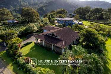 Remodeled kitchen with quartz countertops, wood cabinets and stainless appliances in Boquete house