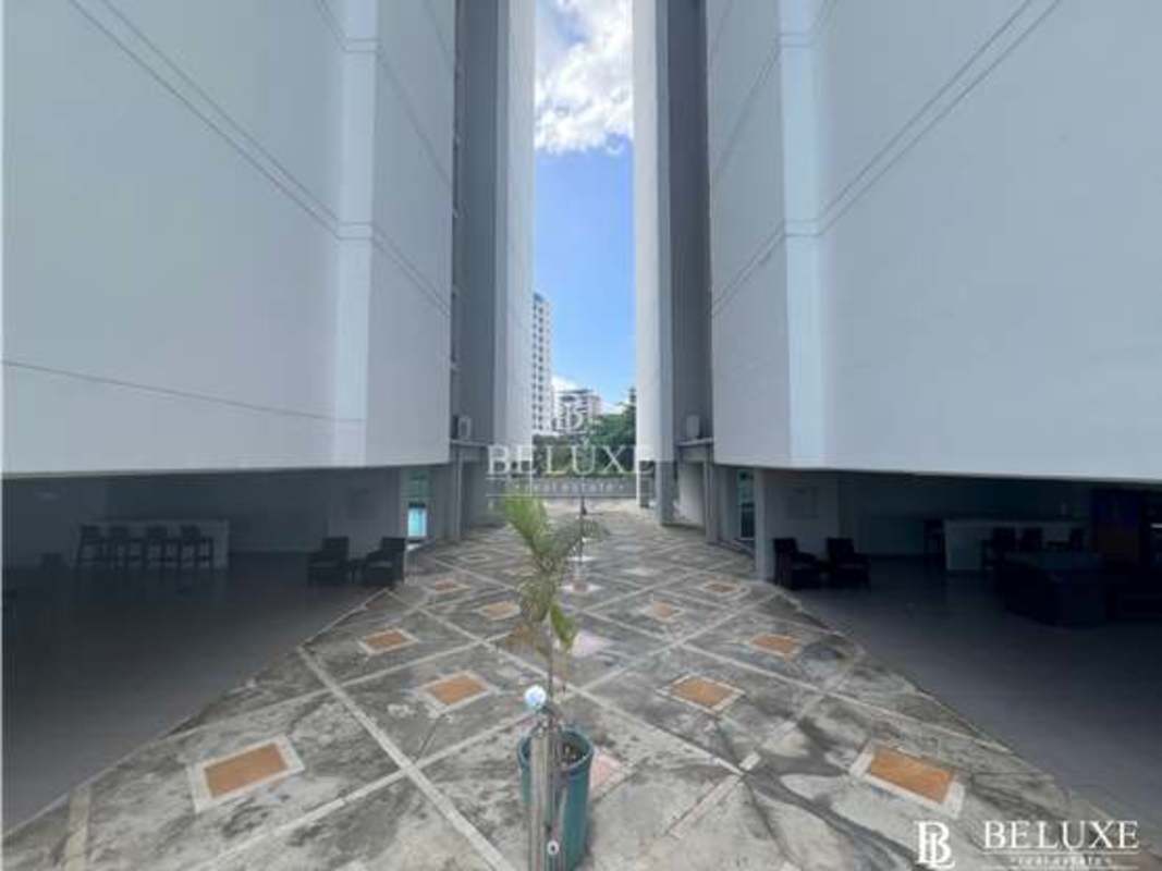 Open courtyard area with modern facades and covered seating PH Kubic El Cangrejo Panama