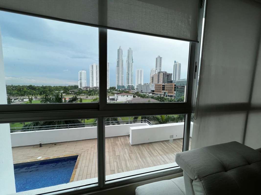 Spacious master bedroom with large windows balcony and sea view PH Soho Costa del Este