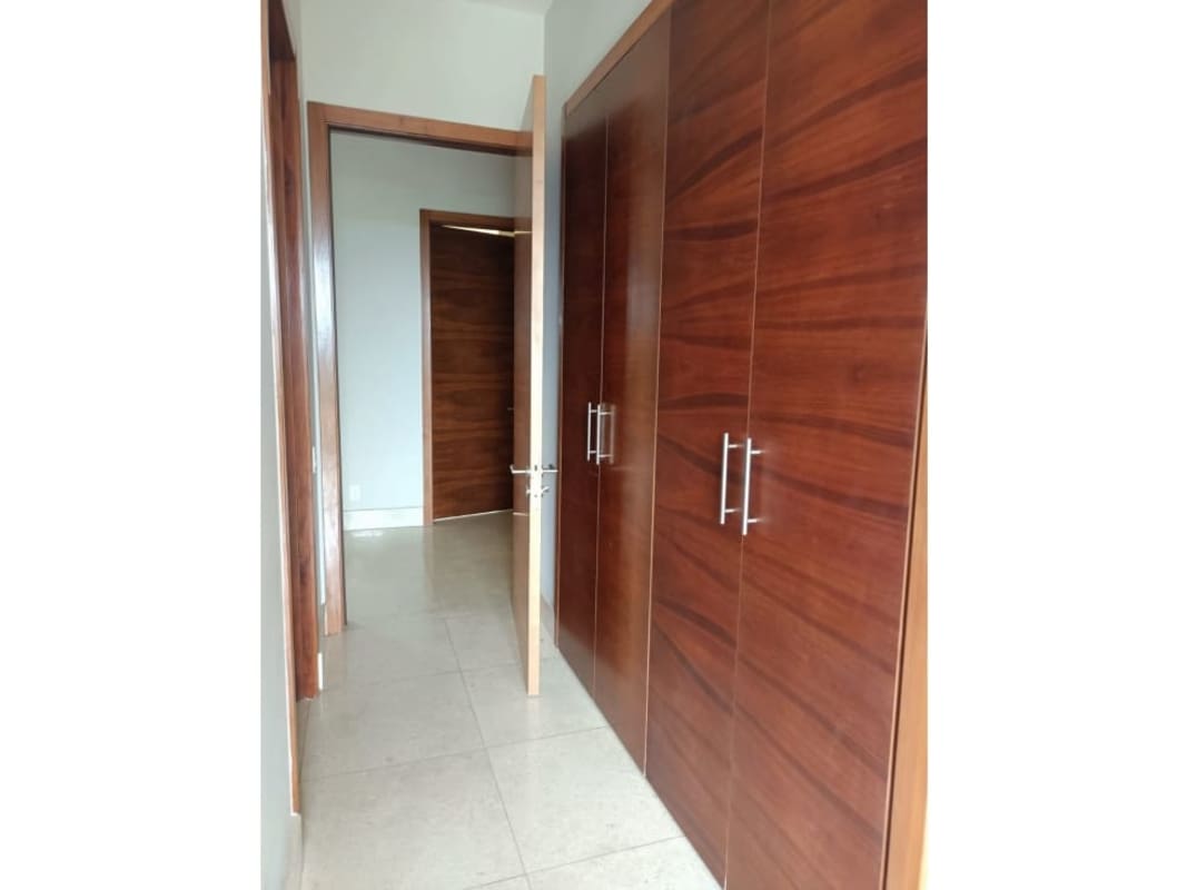 Spacious master bedroom suite with walk-in closet and golf course views PH Santa Maria Court Panama