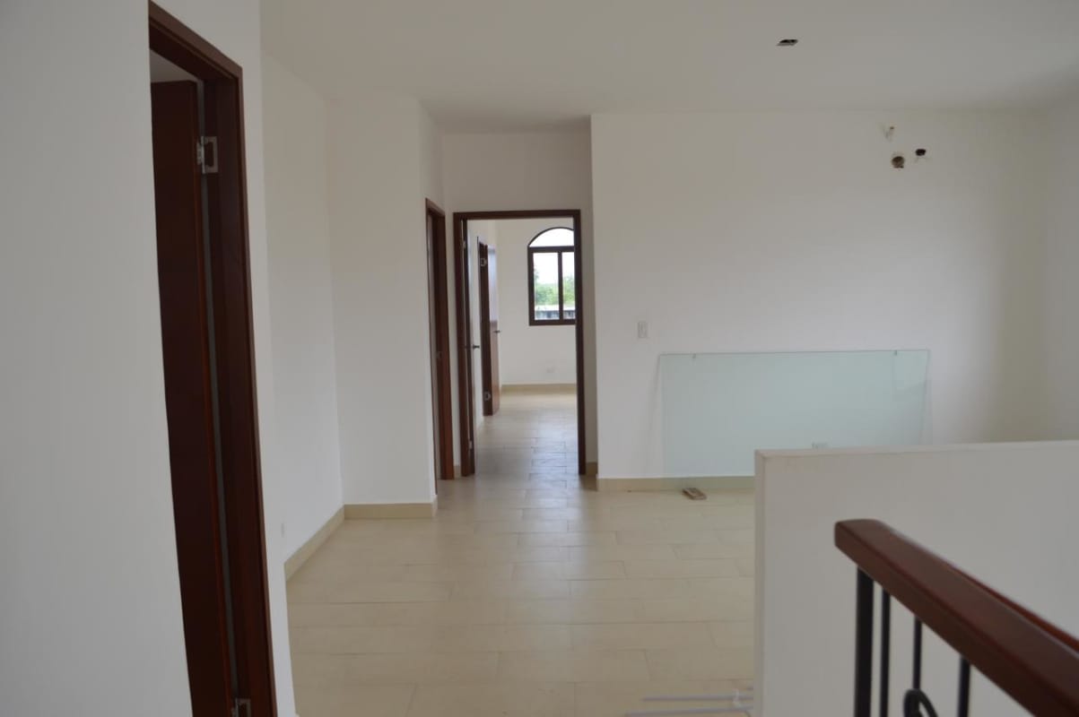 Bright bedroom with closet and bathroom in Costa Sur Panama City