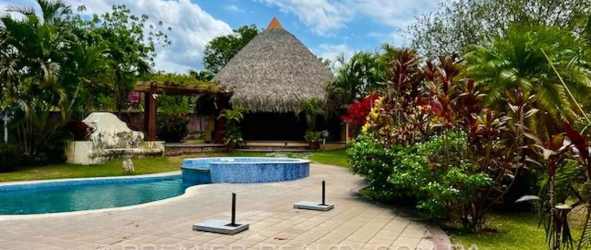 Luxury outdoor living with swimming pool, jacuzzi, palapa, gardens in Coronado Panama