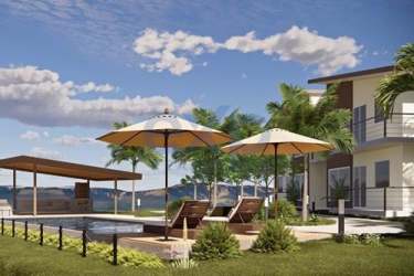 Landscaped garden area with seating and palm trees at Bougainvillea Villas Playa Venao Panama