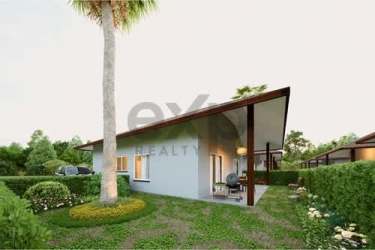 Designer bathroom with glass shower, vessel sink and natural accents in Bali-style villa La Zahina Panama