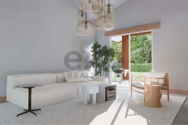 Bright living room in Walnut Villa with sliding glass doors to ocean-view terrace Playa Venao Panama