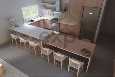 Bright bedroom in Walnut Villa with large windows and garden view Playa Venao Panama