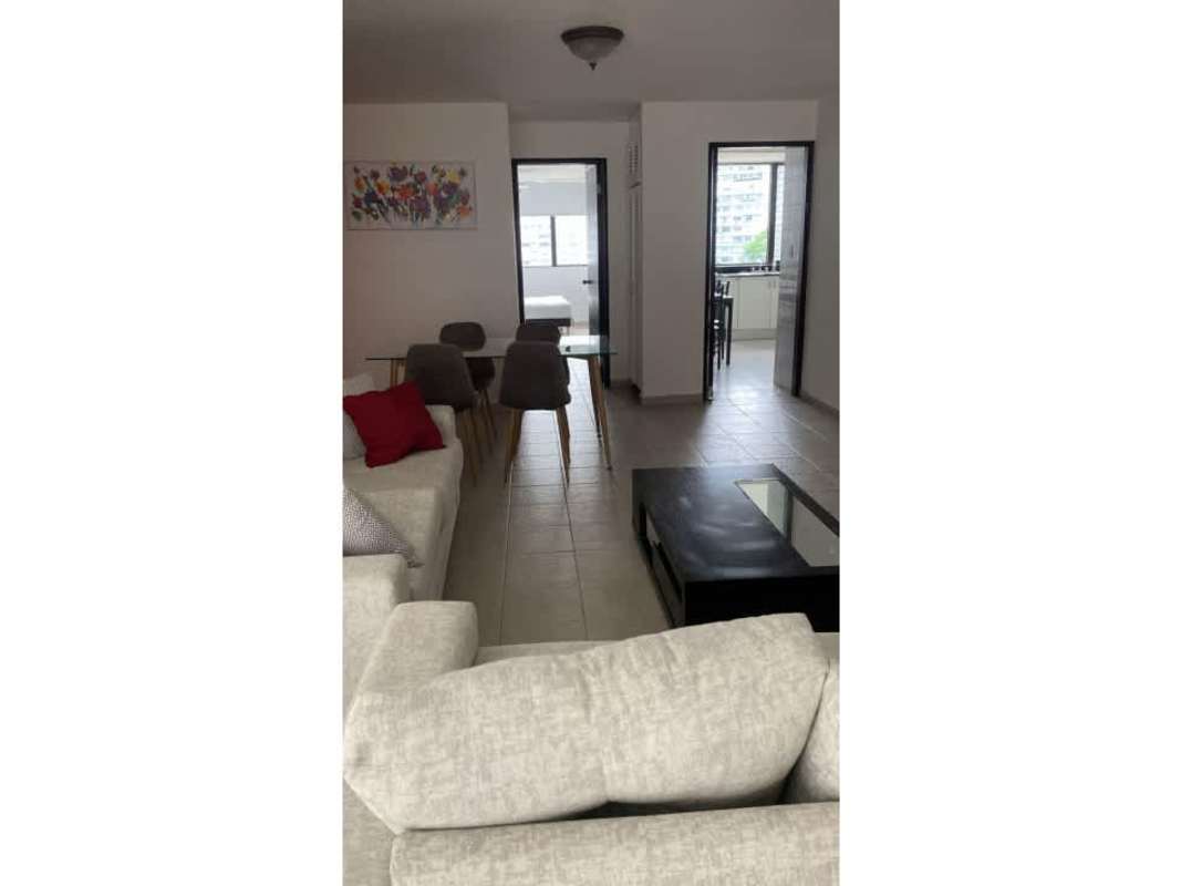 Open-plan living and dining area with bright windows and tile floor PH Paitilla Point Panama