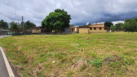Flat grassy land plot fenced on side near La Chorrera Fairgrounds Panama