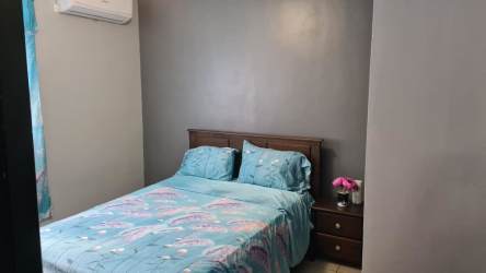 Dining area near balcony with ocean view in Coronado beachfront rental apartment Panama