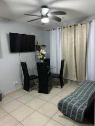 Bedroom with queen bed, balcony access and ocean views in Coronado Bay apartment Panama