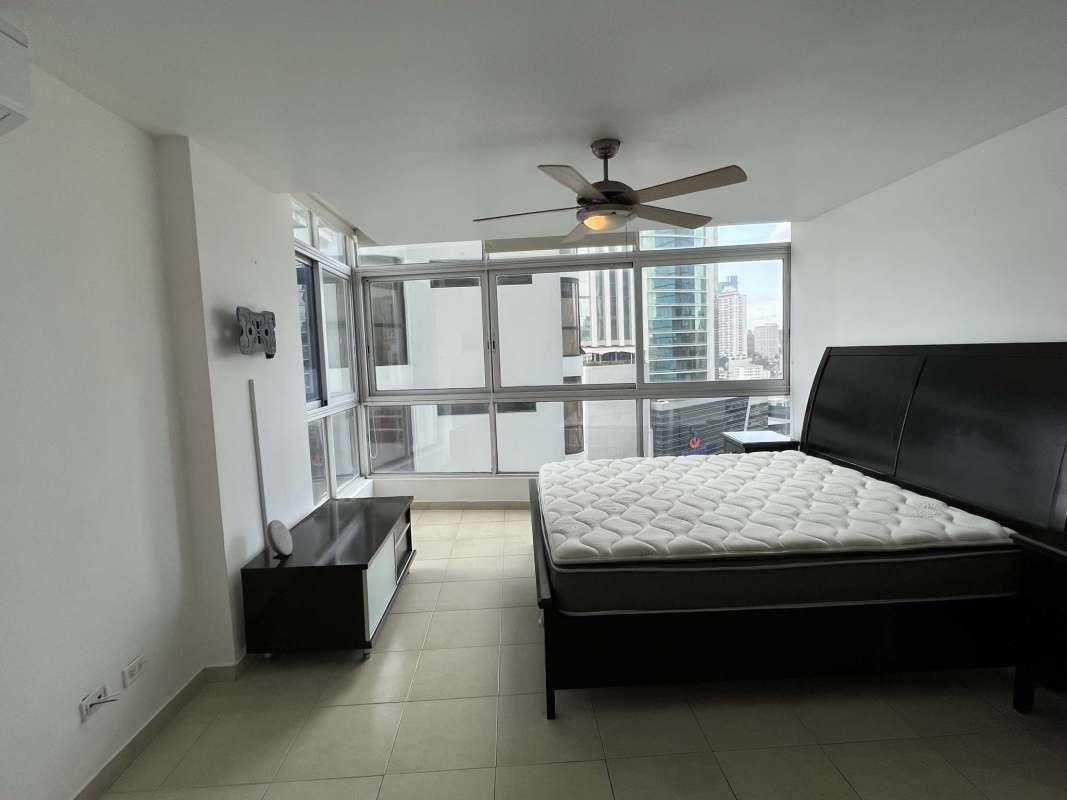 Modern bathroom with glass shower, vanity and large window in PH BICSA Tower Avenue Balboa apartment