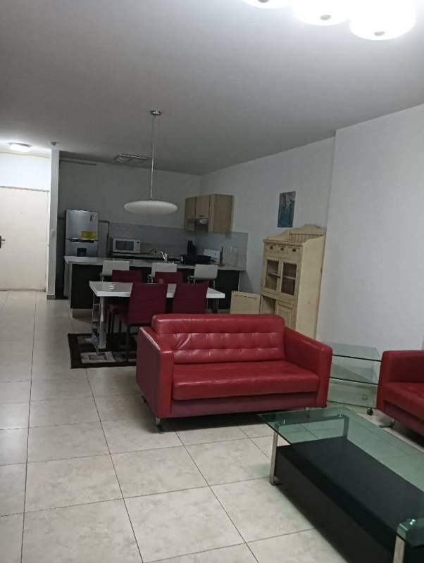 Spacious furnished bedroom with large windows ocean and city views PH BICSA Tower Avenida Balboa Panama