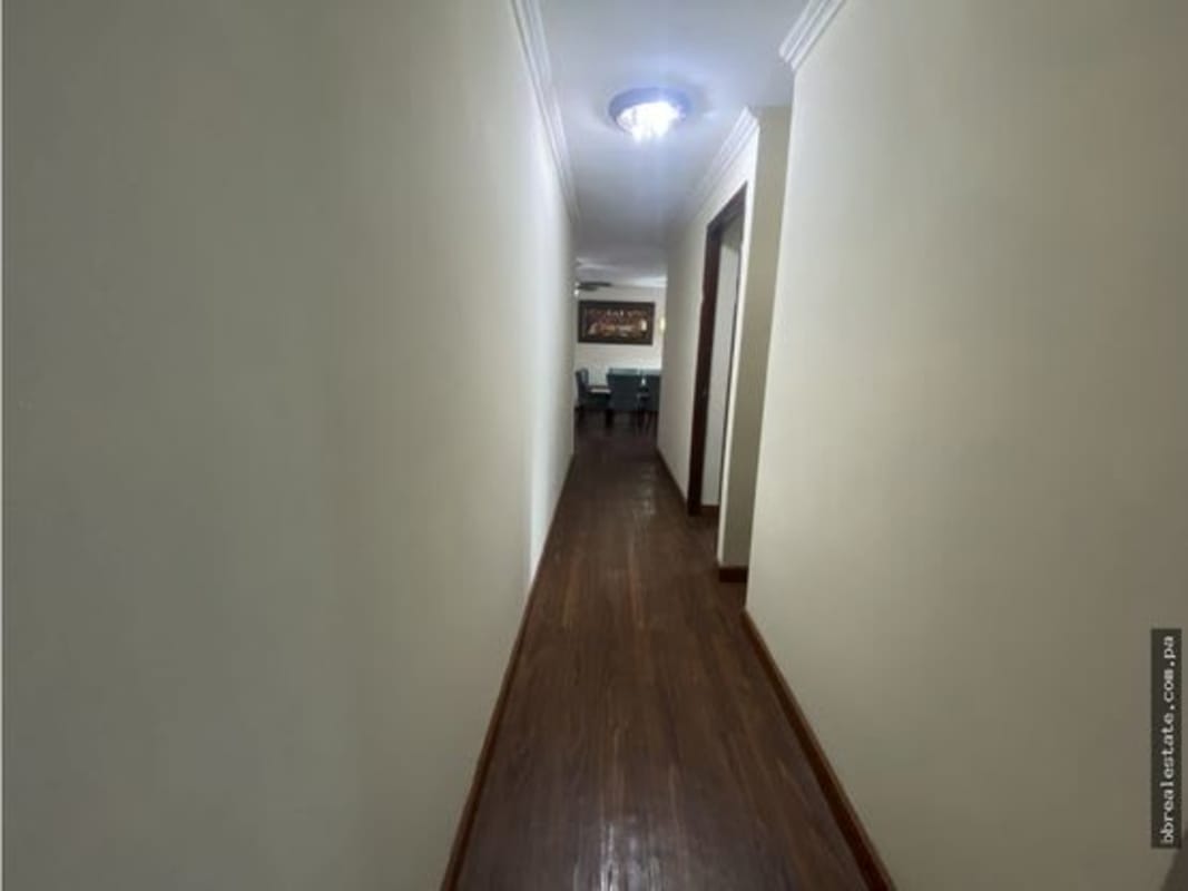 Covered outdoor pool space with lounge chairs Sunrise Tower Panama