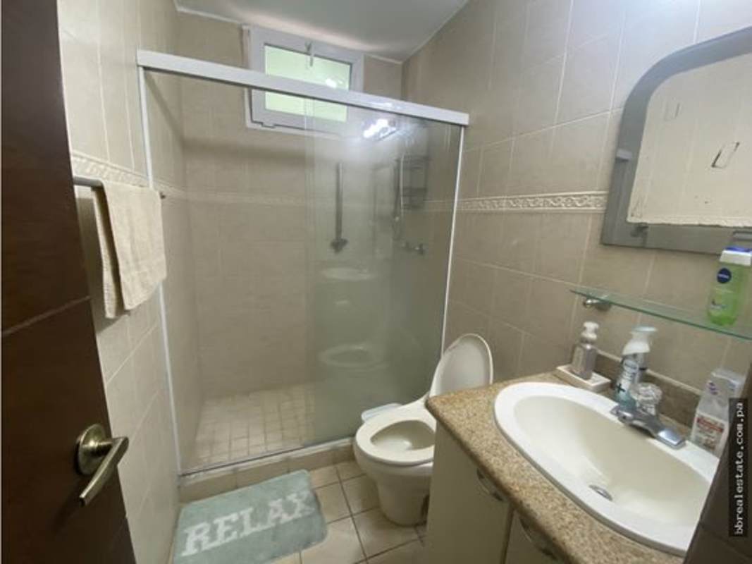 Modern balcony with outdoor dining city skyline Sunrise Tower Obarrio