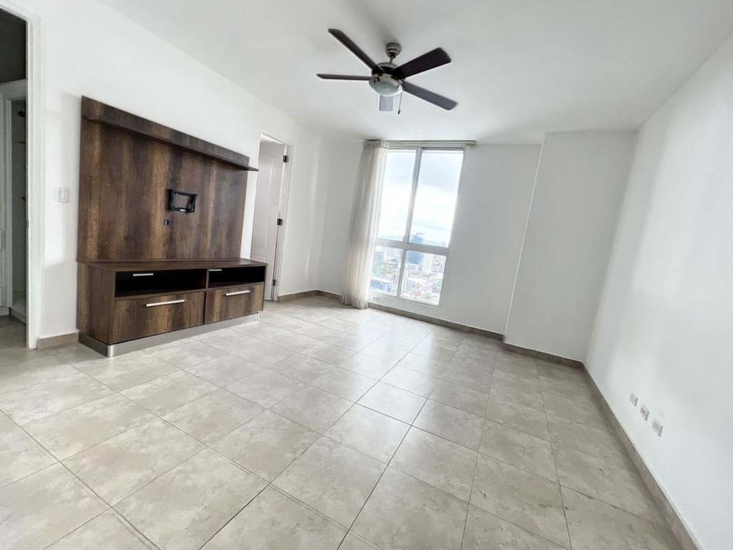 Family room with large window and city view PH Mystic Point Punta Pacífica Panama