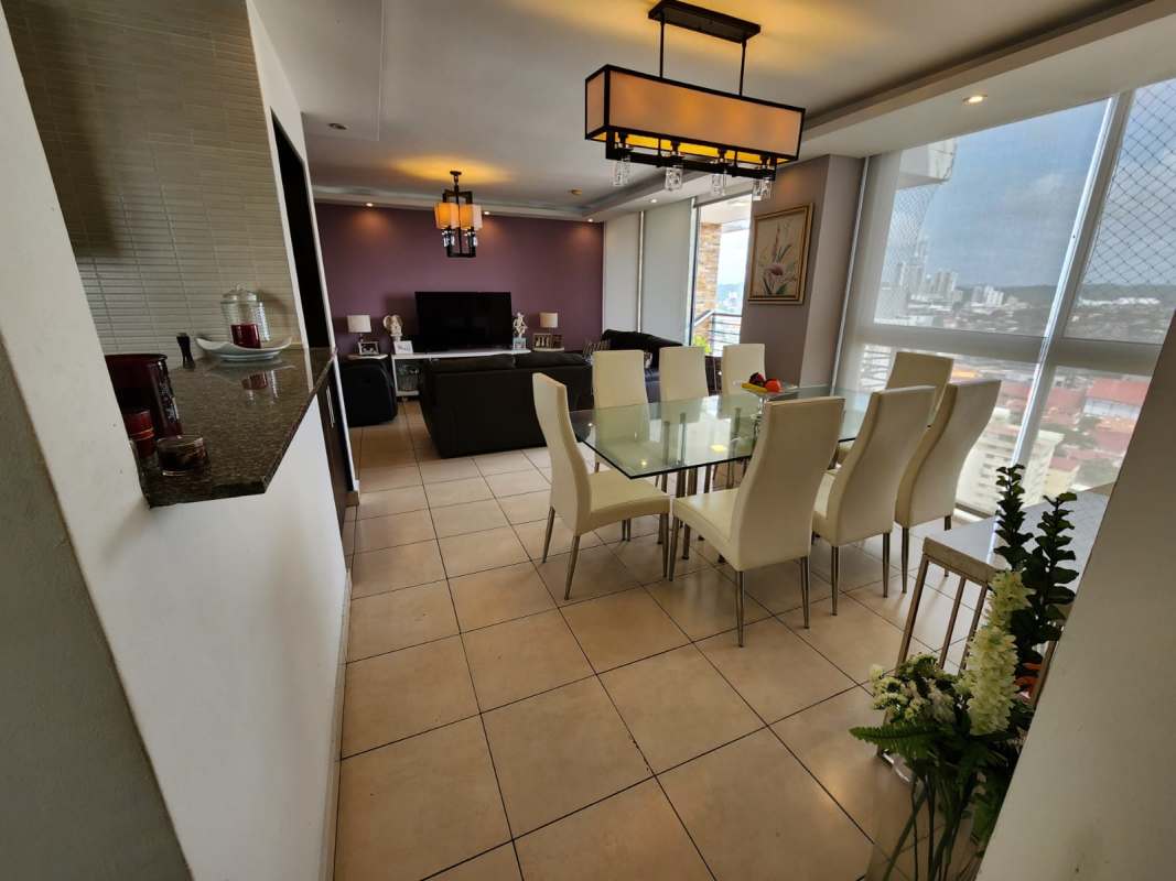 Spacious open-plan living and dining room with large windows city view PH Ecco Tower Panama