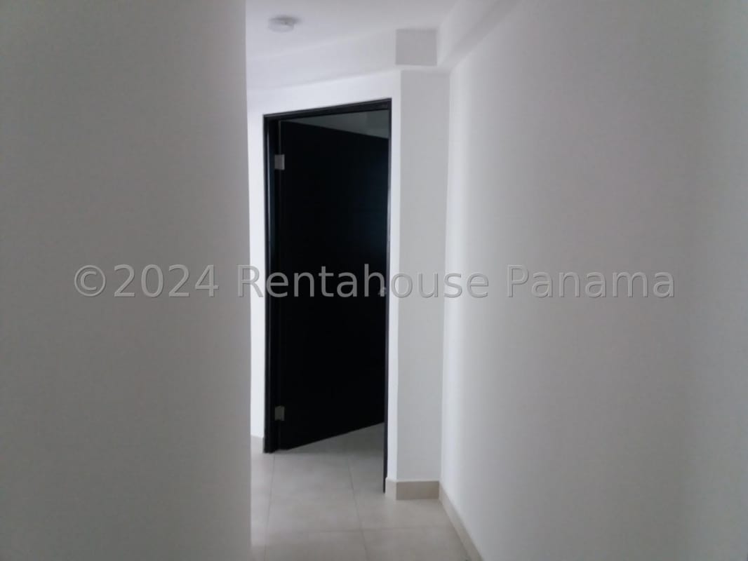 Spacious bright living room with tiled floor and enclosed balcony in PH Edison Park Panama