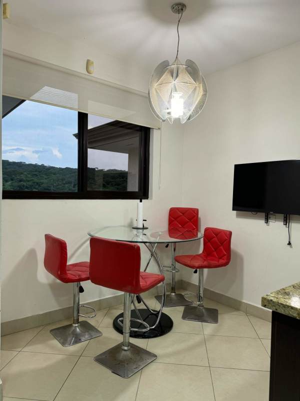Dining area with park views furnished penthouse Embassy Club Clayton Panama City