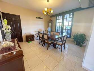 Spacious living dining area with tile floors and large windows for rent David Panama