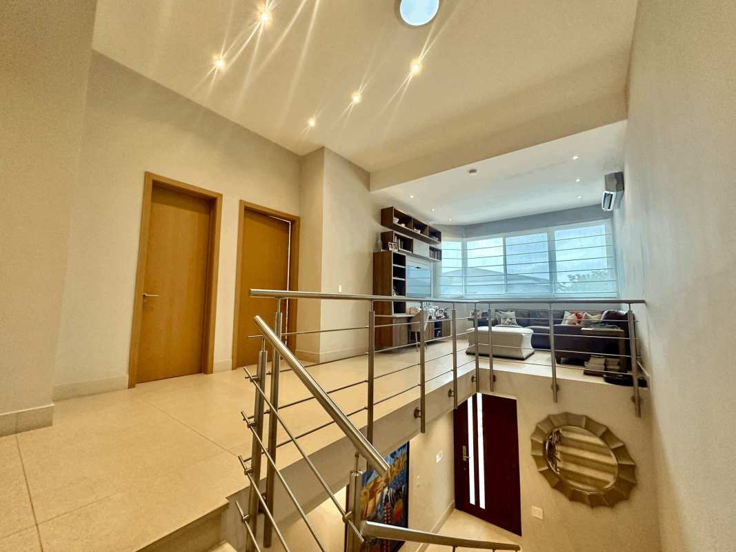 Covered patio lush garden outdoor living The Grove Santa María Panama house