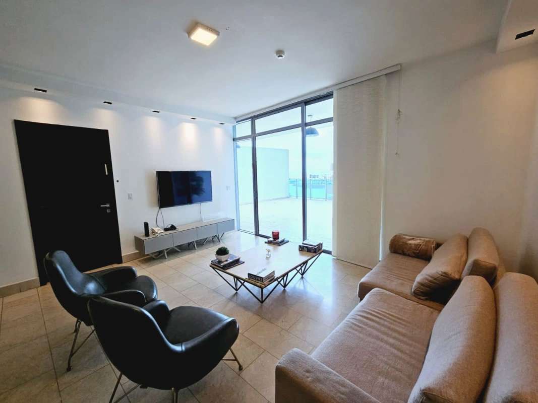Luxury living room with balcony city view Grand Tower Punta Pacifica Panama
