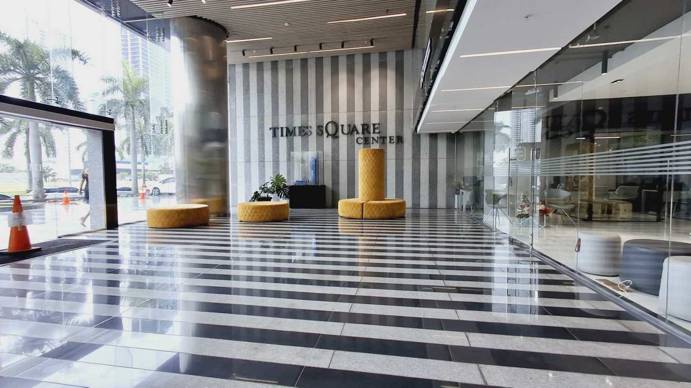 Corner office with panoramic windows overlooking Costa del Este skyline Panama City