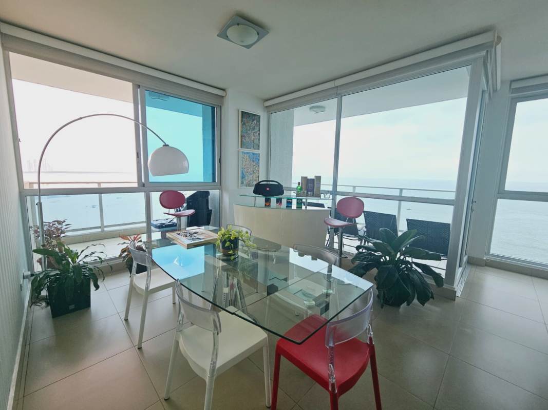 Ample balcony with ocean views and modern glass railing at PH Oceanaire in Punta Pacifica Panama City
