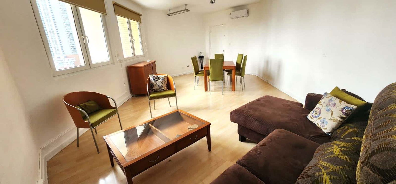 Contemporary living dining room with large windows El Cangrejo PH Vistanova Panama