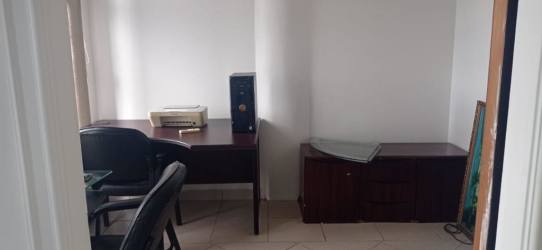 Simple office room with desk chairs printer at Plaza Oeste La Chorrera Panama