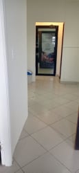 Ceramic tile hallway with glass door leading outside in Plaza Oeste La Chorrera