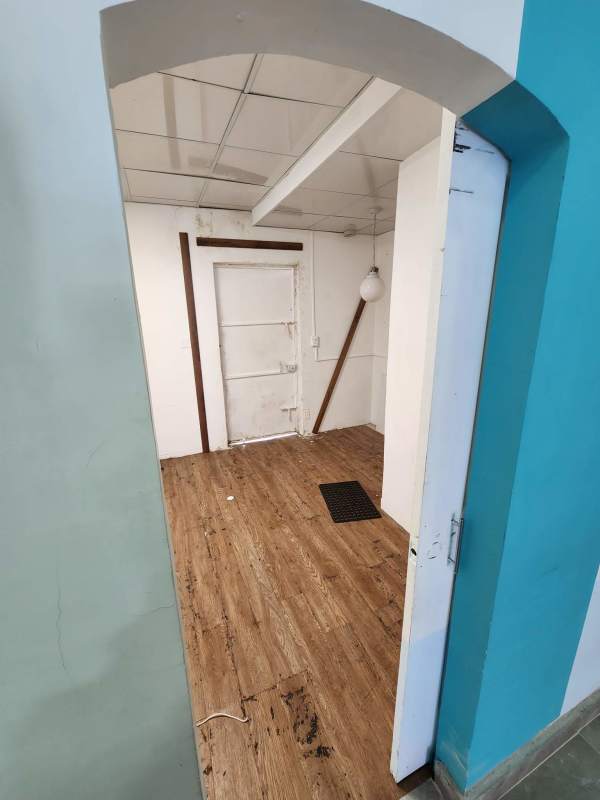 Utility room with small sink cabinet, tile floors in commercial property in Brisas del Golf Panama