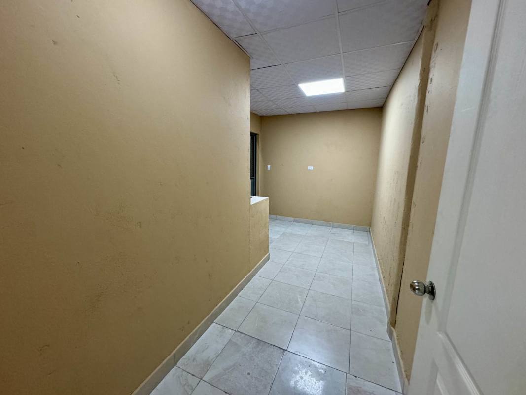 Simple hallway or office area beige walls tile floor commercial space Parque Lefevre Panama
