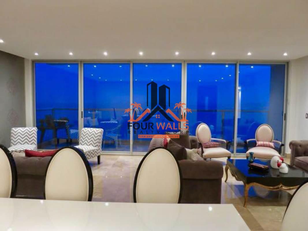 Dining room with ocean views luxury condo PH Q Tower Panama
