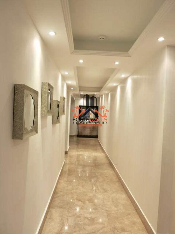 Modern kitchen in luxury apartment with granite countertops, stainless appliances, PH Q Tower Panama