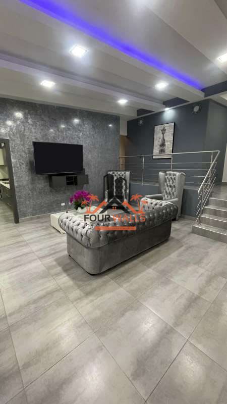 Modern kitchen with cabinets and tile floor in house for rent Condado del Rey Panama