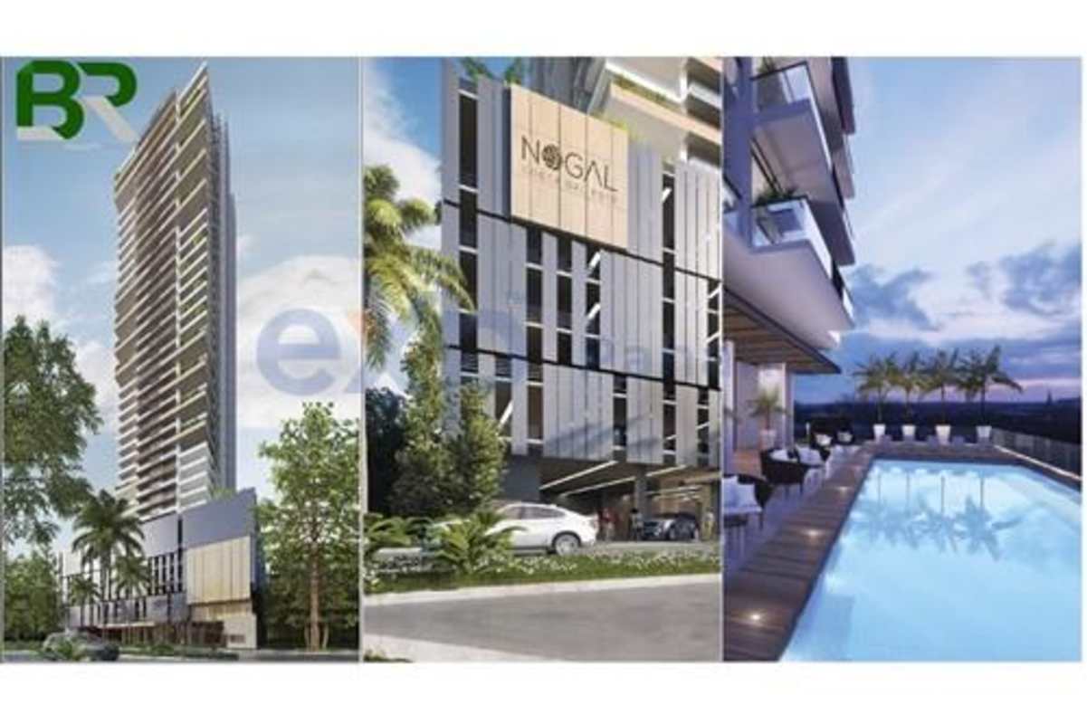 Luxury condominium lobby with vertical garden wood accents in PH Nogal Costa del Este