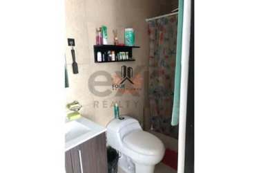 Modern bathroom with white vanity and shower PH Ocean View Panama