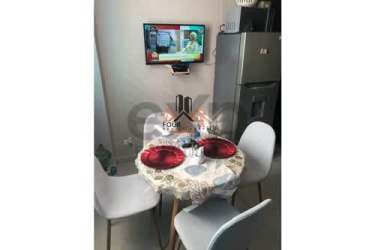 Compact dining area with TV PH Ocean View beach apartment Panama