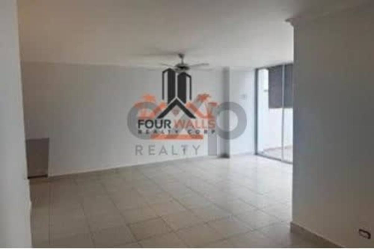 Modern kitchen with granite countertop, overhead cabinets, built-in stove in PH Central Park Panama City