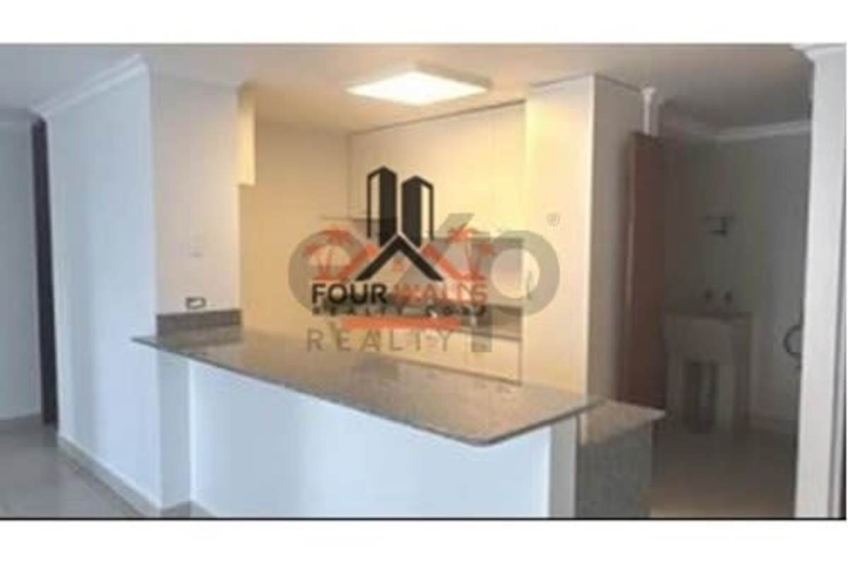 Living room with ceiling fan, sliding doors to balcony, granite kitchen PH Central Park Panama City