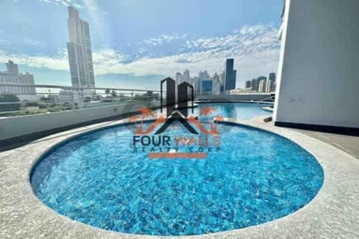 Outdoor pool area with skyline views at PH Terrazas del Pacífico San Francisco Panama