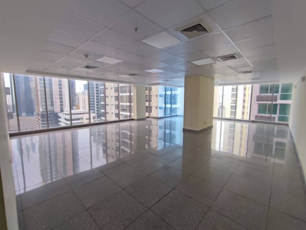Open commercial office with large windows and floor tiles for sale in Torre SFC Obarrio Panama