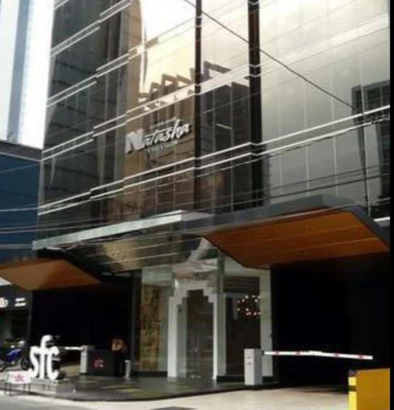 Modern commercial glass facade of Torre SFC office tower in Obarrio Panama City