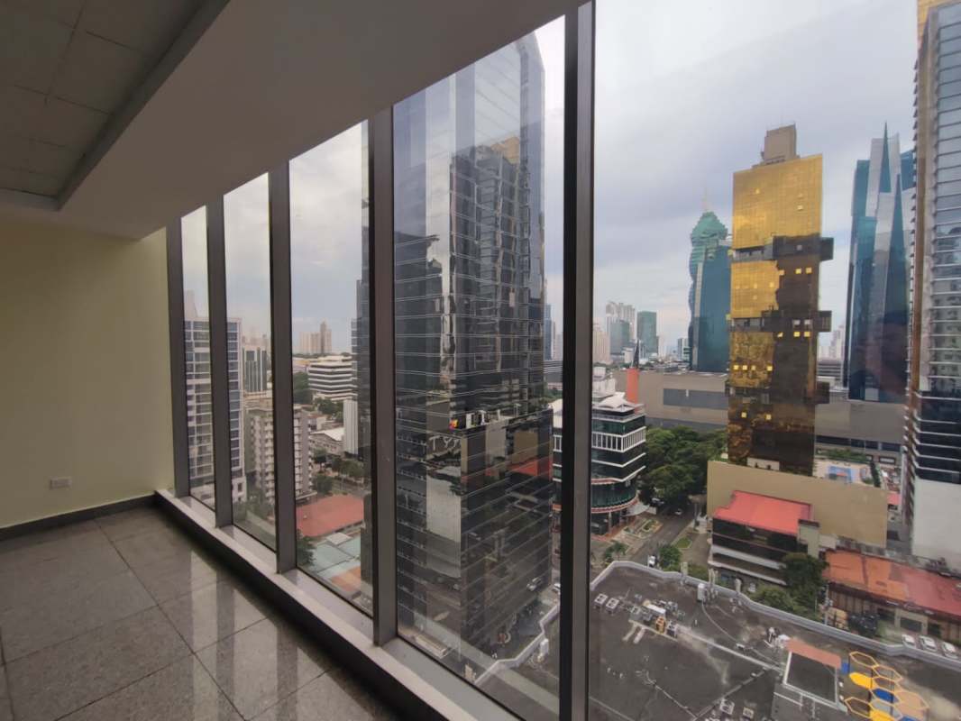 Modern office in Torre SFC with floor-to-ceiling windows and panoramic skyline view Panama