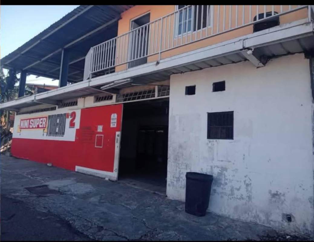 Interior of small grocery store retail with shelves stocked with products Samaria Panama