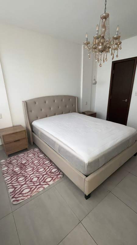 Master bedroom with large bed, city views, en-suite bathroom in PH Jade Tower Panama City