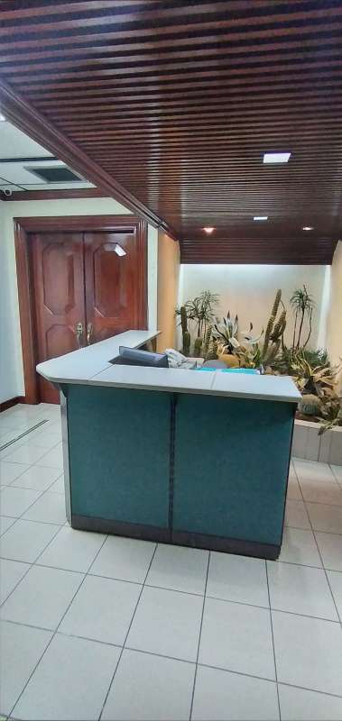 Small enclosed office with frosted glass door desk and phone Plaza 2000 Calle 50 Panama City